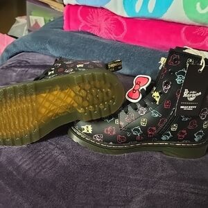 Dr. Martens Black and Red Boots with Playful Design